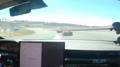 Model S Plaid with McLaren P1 at the track