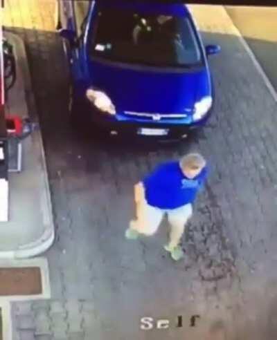 Car driving into gas station