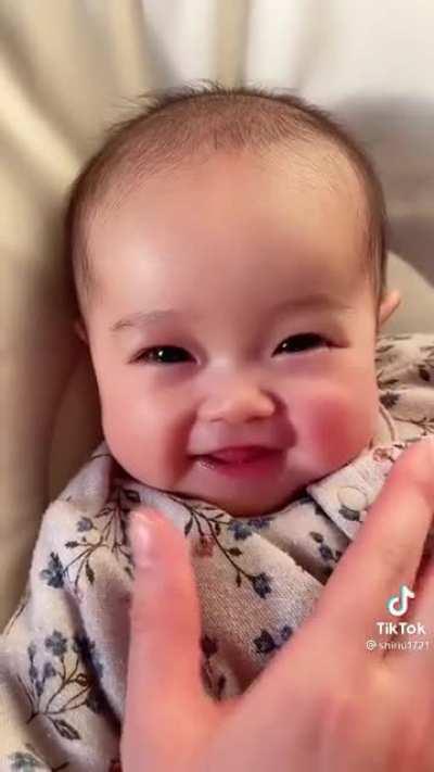 Look at This Cute Smile 😊 A Baby Enjoying Mom’s Touch