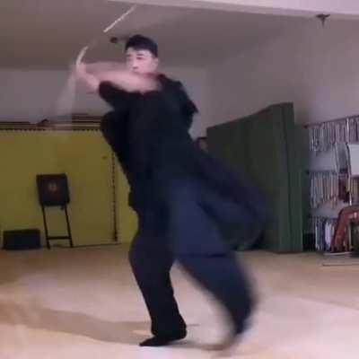 Martial artist using nunchaku