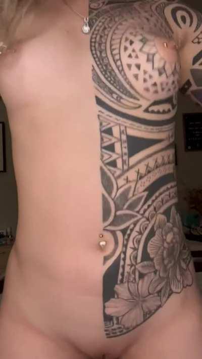 Jumping up and down with tatted tits makes for a mesmerizing combo