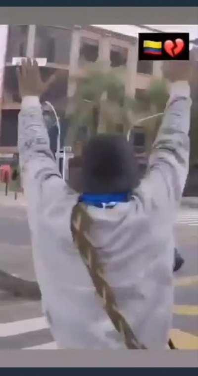 A protestor in Colombia is shot in the head by a police projectile during protests against tax hikes on food and other basic goods