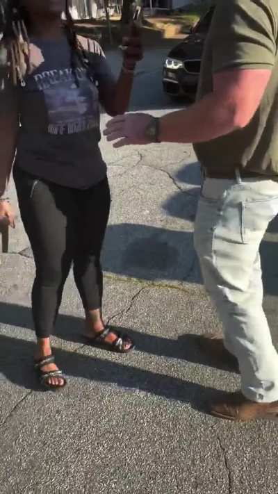 Lady pulls out gun over road rage and gets disarmed