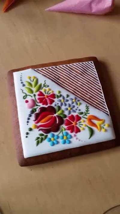 Embroidery style icing on a cookie