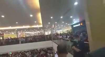 A shopping mall in India announced mid night sale with 50% discount. Not a single person missed the chance.