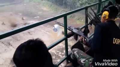 Indonesian soldiers training under live fire