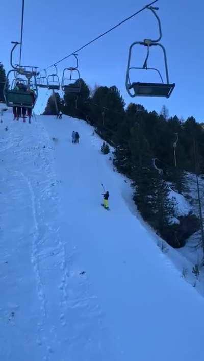 Snowboard beginner on the ski lift