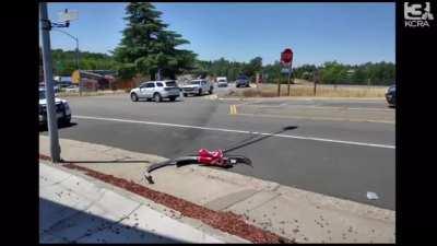 Elderly women takes out a Texaco gas pump