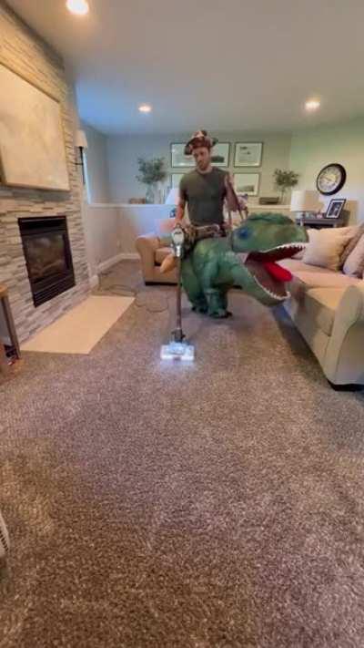 This is hilarious and this guy and his dinosaur are pretty fit!