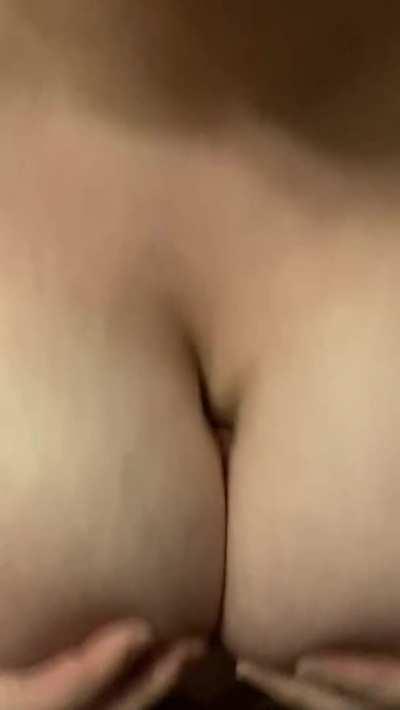 Titty fucking him till he cums