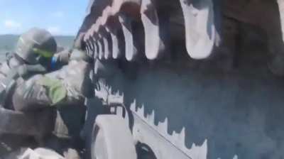 Ukrainian soldiers from Lyut Brigade evacuate wounded comrade under constant artillery fire. Klishchiivka, Donetsk region. 06.2024