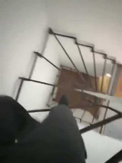 Walking down see through stairs