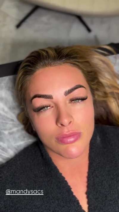 Mandy Rose showing her makeup