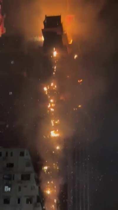 In Hong Kong, a skyscraper under construction caught fire, two people were injured. 03/02/2023.