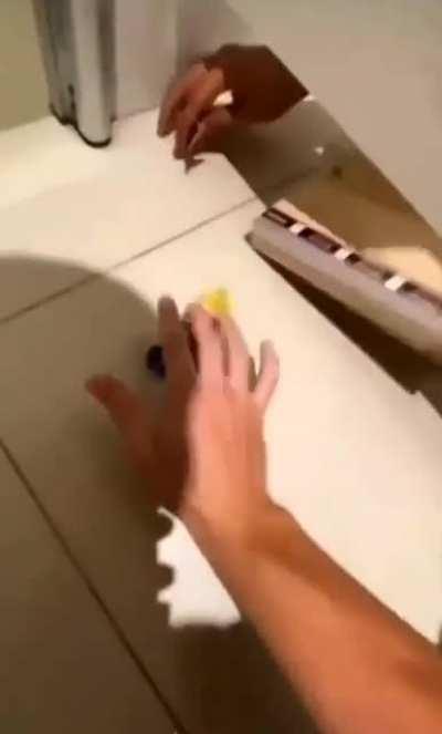 Skateboarding in the bathroom