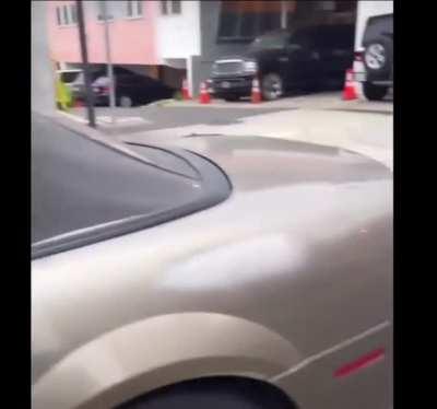 Security Guard stays in his car continuing to sniff aerosols after he crashed into a parked car.