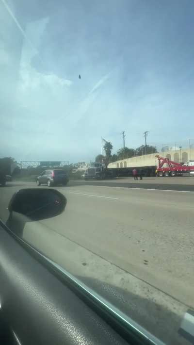 18 wheeler flips on 94 to 805 north😳