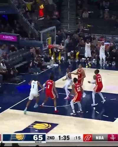 [Highlight] Tyrese Haliburton passes between his own legs to a trailing Buddy Hield who does a spin move bullet pass to Jalen Smith who drains the three.