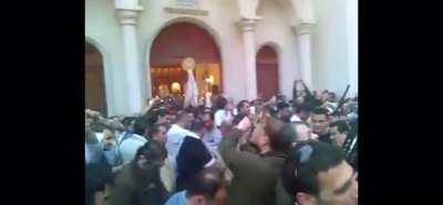 Praise the Lord and Pass the Ammunition. Church service in Syria. Wonder where all those bullets will land?