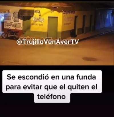 When Playing Metal Gear Solid pays off. Guy hides from 2 guys in a motorcycle that were watching him to steal his phone.