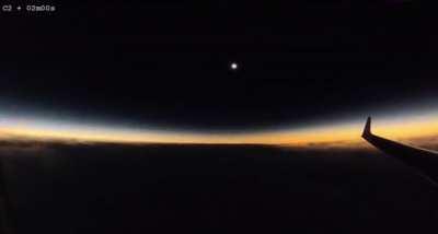 A solar eclipse seen from a plane