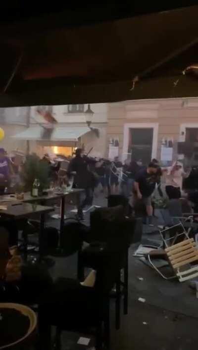 Soccer hooligans fight on the street pt. 2