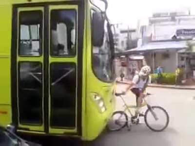 Cyclist fucks with busdriver. When the busdriver hits the cyclist he gets mad like he did nothing