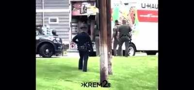 Moment Patriot Front members are exposed by police in Idaho on their way to a Pride Event