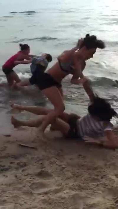 Girls group fight at the beach