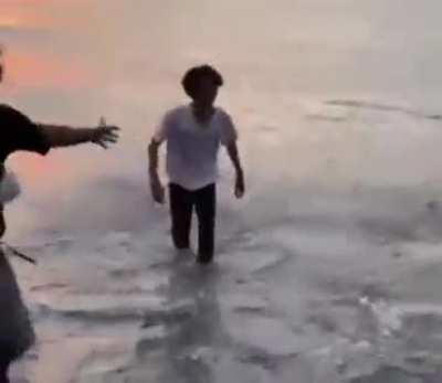 to throw their friend into the water
