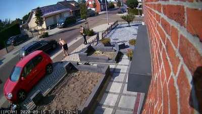 PSA for ATGATT: Security camera shows a rider wearing only shorts vs. a metal fence