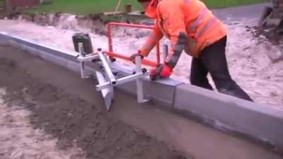 Screeder for precision screeding the concrete bed for the gutters