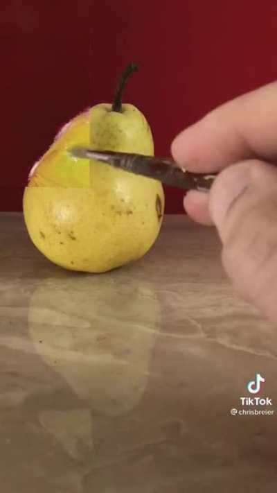 The way this guy matched the pear and the background on paper