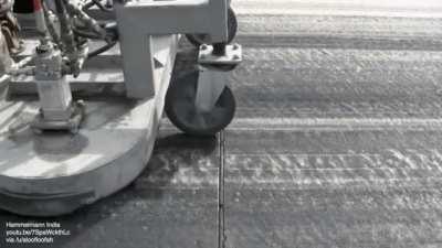 Airports regularly remove rubber from tires that builds up on runways as it affects the level of friction and causes hydroplaning after rain