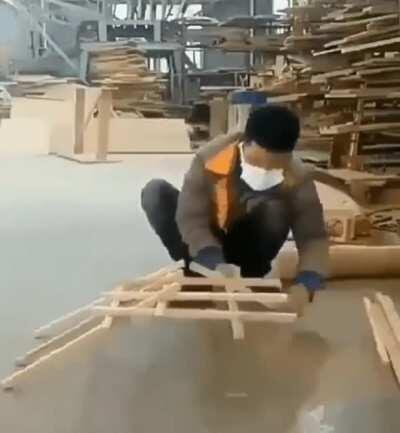 Making a DaVinci bridge out of a pile of wooden sticks