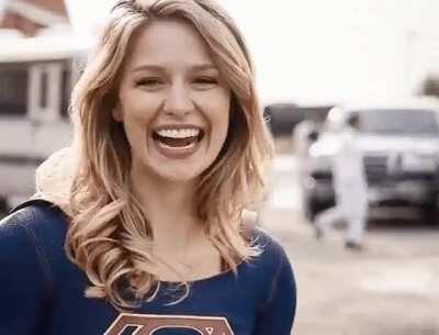 Melissa Benoist doing what she does best: being cute and sexy at the same time as Supergirl
