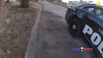 Suspect shooting Oklahoma cop at close range.