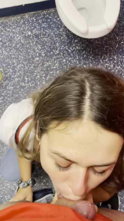 Giving a blowjob in the stall at the game