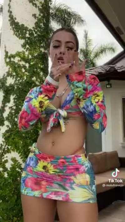 Malu Trevejo in a short skirt and orange thong