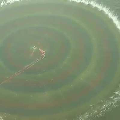 Throwing a fishing net.