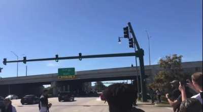 Bystanders were egging drivers on to do burnouts at this intersection. An orange Chevelle takes the bait and pays the price.