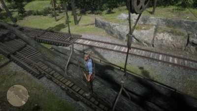 You can stand on a log, while it's being lifted onto the train in the lumber camp!