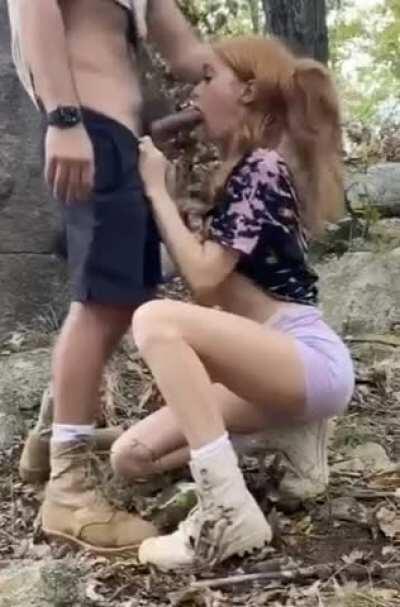 Hotwife deepthroated by friend in a forest