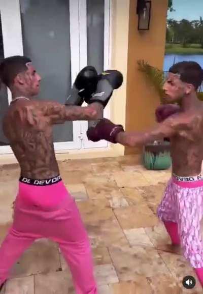 Two toddlers left alone with nothing but boxing gloves and pens to keep themselves happy.