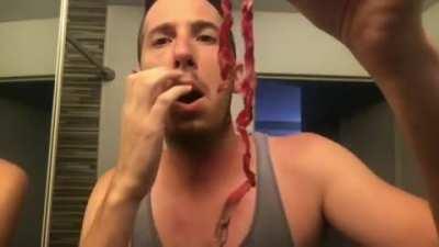 what is he pulling out of his neck? wtf man