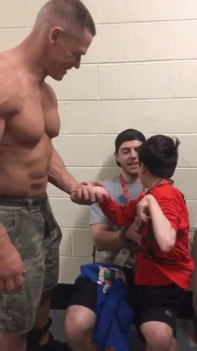 Little boy who is a big fan of John Cena got to go backstage and meet him.
