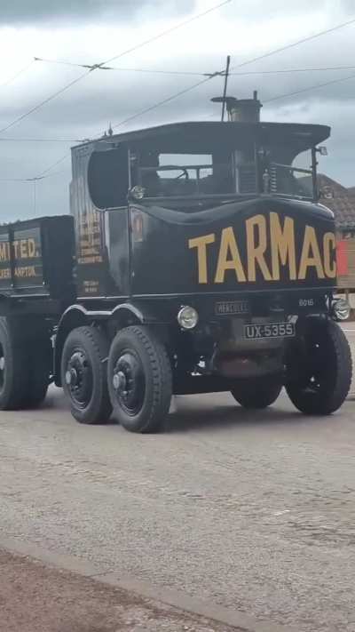 Steam-powered vehicles travelling around the Beamish Open Air Museum in County Durham, England