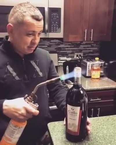 HMB while I Open A Wine Bottle With A Blow Torch