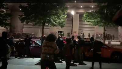 Portland cops shoot peaceful protester holding a boom box in the head with rubber bullet