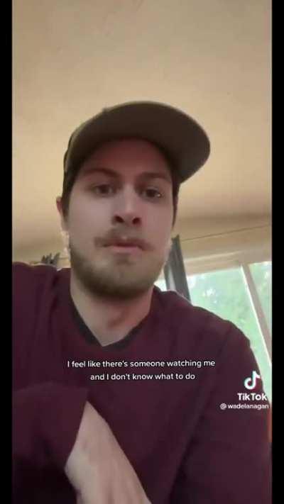 Man find a photo on his phone of himself sleeping